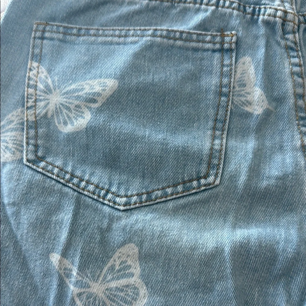 SHEIN Blue Jean Shorts with Distressed Butterfly Design